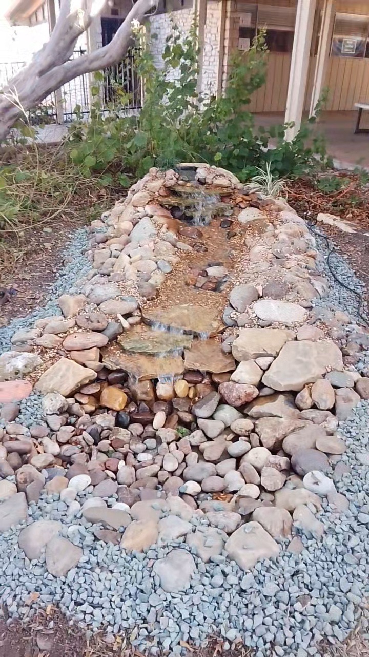 Completed waterfall pond — front view